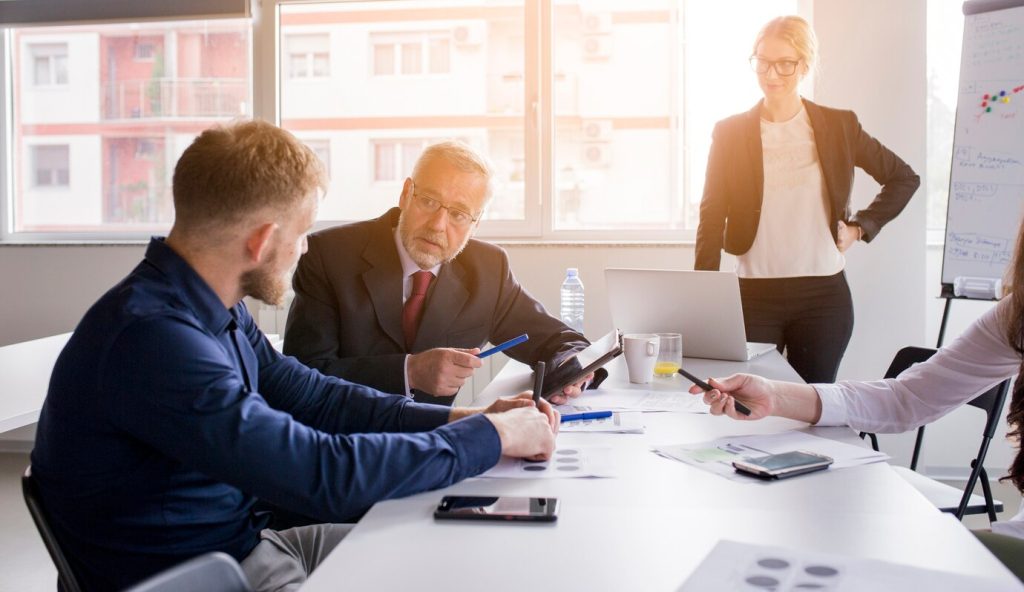 two-businessman-discussing-project-meeting_23-2147923440