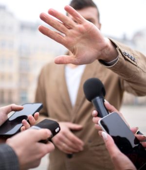 close-up-reporter-taking-interview_23-2149183656