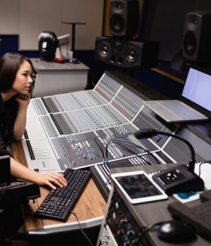 female-student-using-sound-mixer_107420-64841