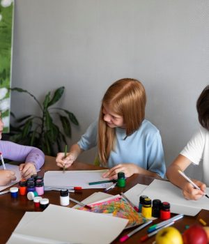 medium-shot-kids-painting-indoors_23-2149632403