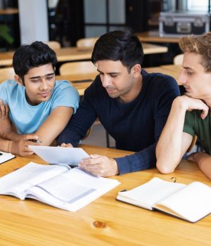 three-serious-students-studying-using-tablet-computer_1262-15312